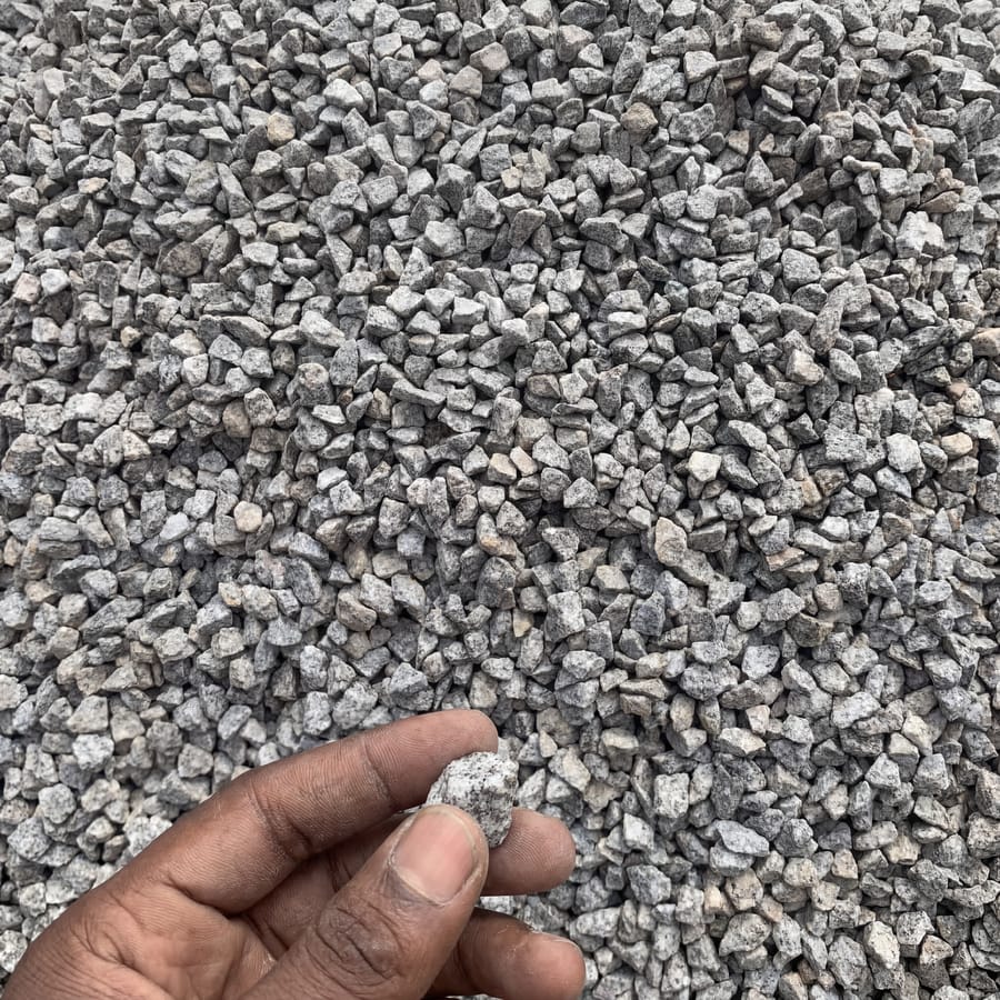 Chippings ½" texture close-up, hand for scale